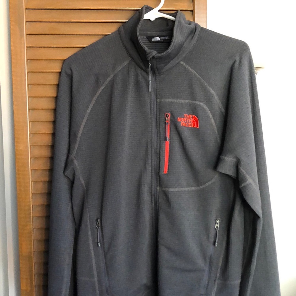 The North Face Men’s lightweight zip up fleece.